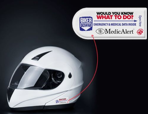 Biker Down campaign banner with a Bike helmet and MedicAlert helmet tag beside it