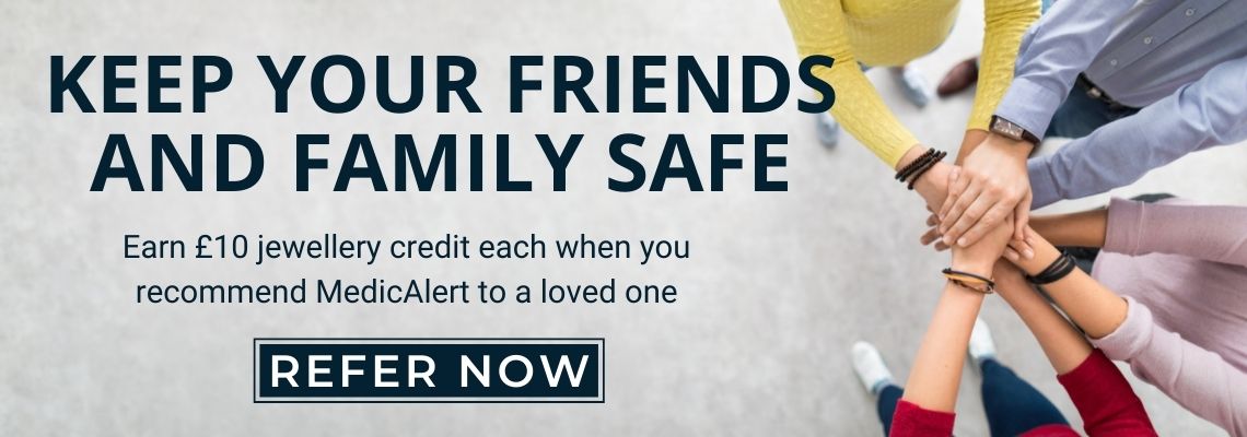 Banner showing people putting hands together. Says 'Keep your friends and family safe - Earn £10 jewellery credit each when you recommend MedicAlert to a loved one'. Button: Refer Now